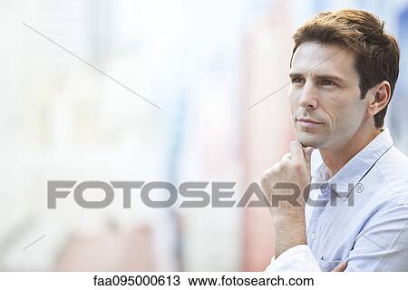 Mid-adult man in thought, portrait View Large Photo Image Stock Image - Mid-adult man in thought, portrait. Fotosearch