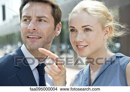 Real estate agent showing property to potential buyer View Large Photo Image Picture - Real estate agent showing property to potential buyer. Fotosearch