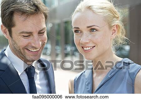 Real estate agent with potential buyer View Large Photo Image Stock Photograph - Real estate agent with potential buyer. Fotosearch