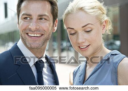 Real estate agent with potential buyer View Large Photo Image Stock Photography - Real estate agent with potential buyer. Fotosearch
