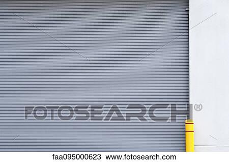 Stock Image - Rolling garage door. Fotosearch
