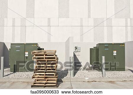 Stack of pallets by transformers View Large Photo Image Stock Image - Stack of pallets by transformers. Fotosearch