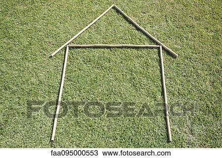 Sticks arranged in house shape on grass View Large Photo Image Stock Image - Sticks arranged in house shape on grass. Fotosearch