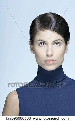 Stock Photograph - Woman, looking at camera, portrait. Fotosearch