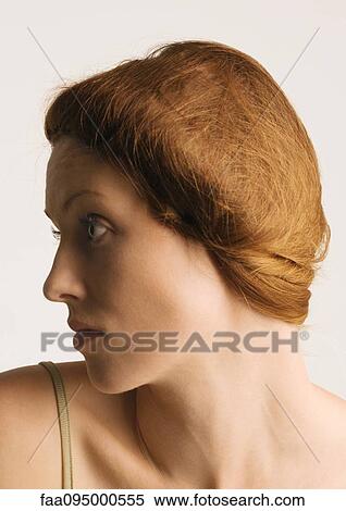 Stock Photography - Woman with hair back, profile. Fotosearch