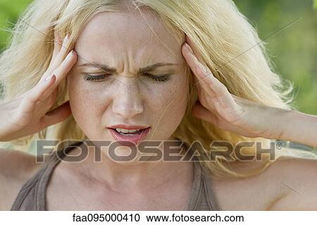 Woman with head in hands View Large Photo Image Stock Image - Woman with head in hands. Fotosearch