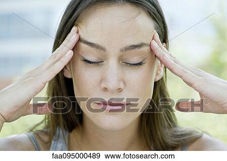 Woman with head in hands View Large Photo Image Stock Photo - Woman with head in hands. Fotosearch
