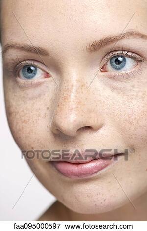 Young woman looking away, close-up portrait View Large Photo Image Stock Photo - Young woman looking away, close-up portrait. Fotosearch