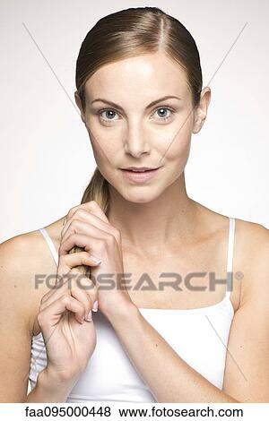 Stock Photo - Young woman, portrait. Fotosearch