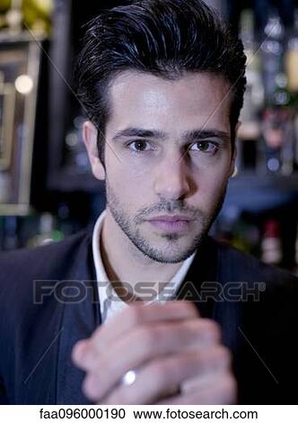 Bartender preparing mixed drink with shaker View Large Photo Image Stock Image - Bartender preparing mixed drink with shaker. Fotosearch