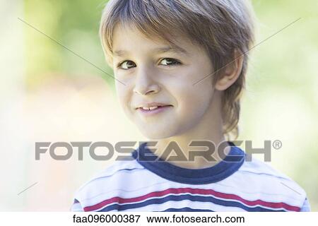 Boy in striped shirt View Large Photo Image Stock Photo - Boy in striped shirt. Fotosearch