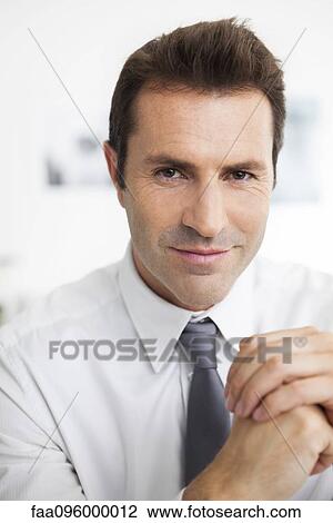 Stock Image - Businessman, portrait. Fotosearch