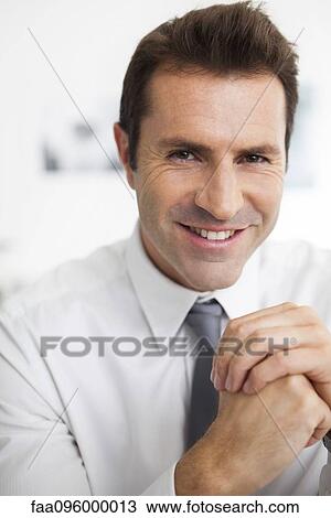 Stock Image - Businessman, portrait. Fotosearch