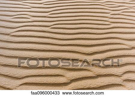 Stock Image - Close-up of rippled sand. Fotosearch