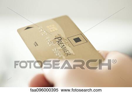 Hand holding credit card View Large Photo Image Stock Photography - Hand holding credit card. Fotosearch
