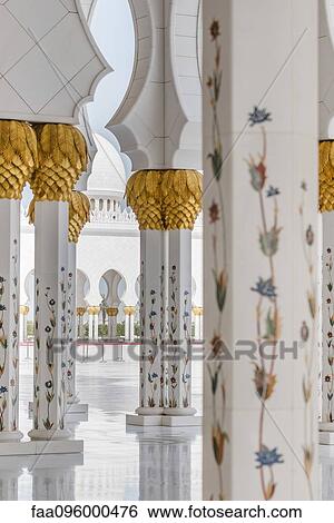 Stock Photograph - Ornate columns, Sheikh Zayed Mosque, Abu Dhabi, United Arab Emirates. Fotosearch
