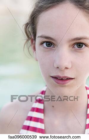 Stock Photo - Preteen girl, portrait. Fotosearch