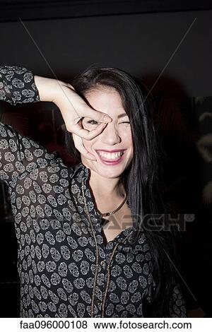 Woman making funny face, portrait View Large Photo Image Stock Photo - Woman making funny face, portrait. Fotosearch