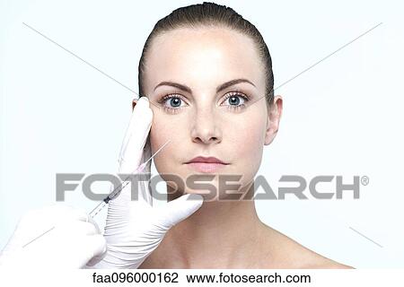 Woman receiving collagen injection View Large Photo Image Stock Image - Woman receiving collagen injection. Fotosearch