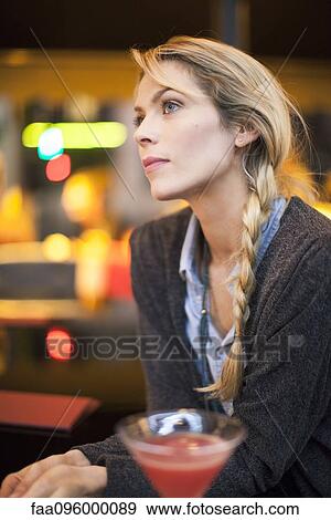 Stock Photo - Woman with cocktail. Fotosearch