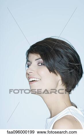 Woman with short hair, smiling, portrait View Large Photo Image Stock Photo - Woman with short hair, smiling, portrait. Fotosearch
