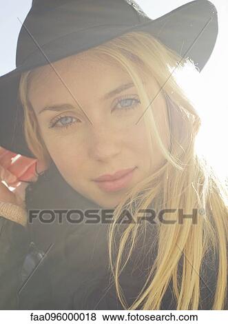 Stock Photo - Young woman, portrait. Fotosearch