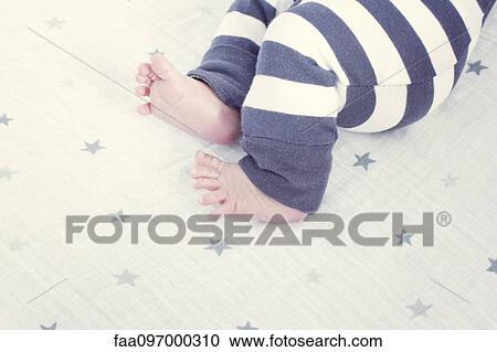 Baby's legs and feet View Large Photo Image Stock Image - Baby's legs and feet. Fotosearch