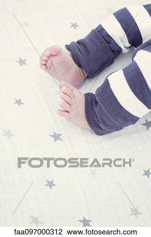 Baby's legs and feet View Large Photo Image Stock Image - Baby's legs and feet. Fotosearch