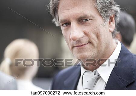 Stock Image - Business executive, portrait. Fotosearch