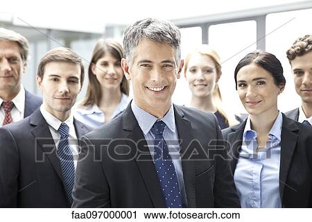 Stock Image - Business executives, portrait. Fotosearch