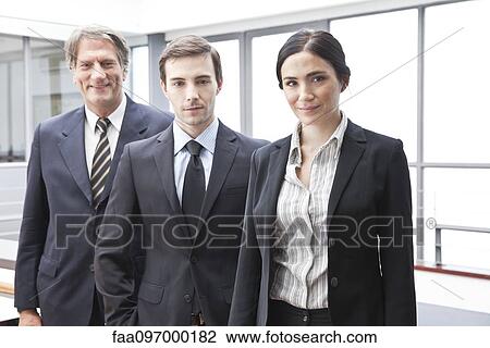 Stock Image - Business executives, portrait. Fotosearch