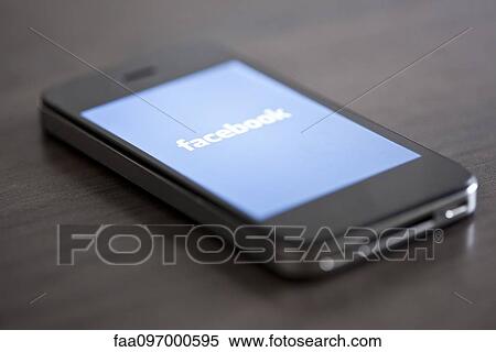 Close-up of smartphone displaying social media app View Large Photo Image Stock Photography - Close-up of smartphone displaying social media app. Fotosearch