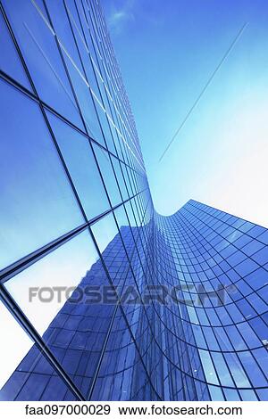 Stock Photo - Facade of modern skyscraper, La Defense, Paris, France. Fotosearch