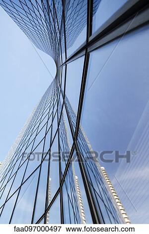Stock Photo - Facade of modern skyscraper, La Defense, Paris, France. Fotosearch