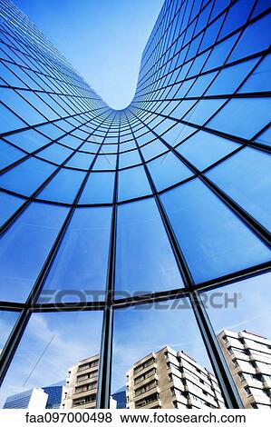 Stock Photo - Facade of modern skyscraper, La Defense, Paris, France. Fotosearch