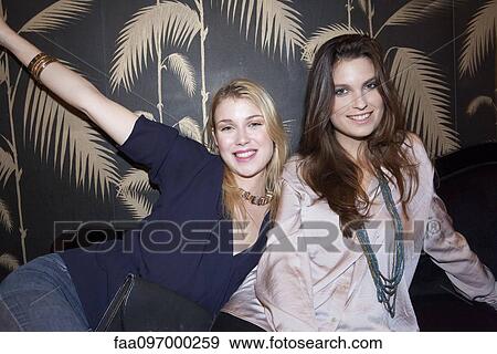 Stock Photo - Friends partying together. Fotosearch