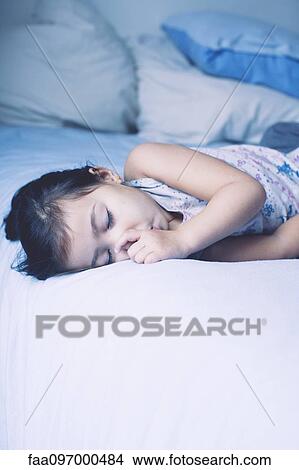 Little girl asleep, portrait View Large Photo Image Picture - Little girl asleep, portrait. Fotosearch