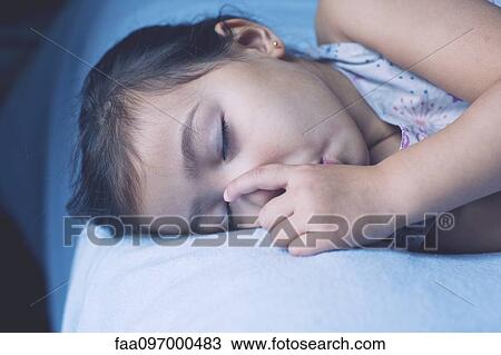 Little girl asleep, portrait View Large Photo Image Stock Image - Little girl asleep, portrait. Fotosearch