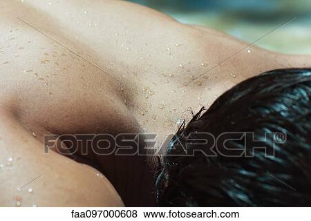 Man's wet back and hair, cropped View Large Photo Image Stock Photo - Man's wet back and hair, cropped. Fotosearch