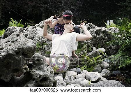 Mother spending quality time with daughter outdoors View Large Photo Image Stock Photography - Mother spending quality time with daughter outdoors. Fotosearch