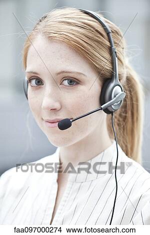 Operator wearing phone headset View Large Photo Image Picture - Operator wearing phone headset. Fotosearch