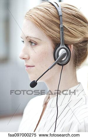 Stock Photography - Receptionist at work. Fotosearch
