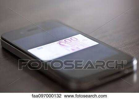 Smartphone displaying image of five-hundred euro banknote View Large Photo Image Stock Image - Smartphone displaying image of five-hundred euro banknote. Fotosearch
