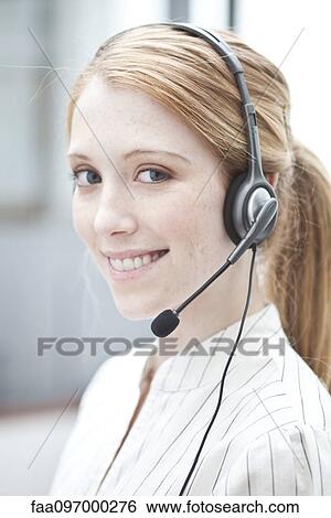 Telemarketer at work View Large Photo Image Stock Photograph - Telemarketer at work. Fotosearch