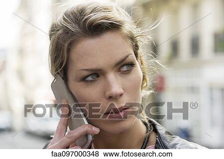 Woman using cell phone View Large Photo Image Stock Photo - Woman using cell phone. Fotosearch