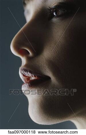 Stock Photo - Woman's face, profile, close-up. Fotosearch