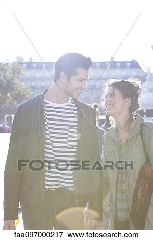 Stock Photo - Young couple together for city outing. Fotosearch