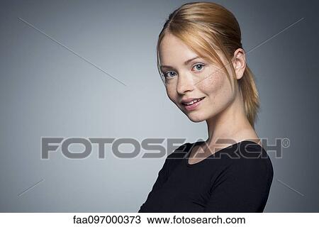 Stock Image - Young woman, portrait. Fotosearch