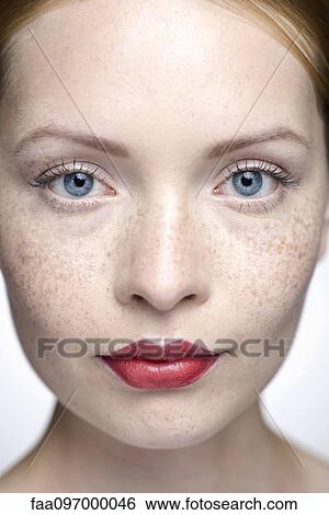 Young woman wearing red lipstick, close-up View Large Photo Image Stock Photograph - Young woman wearing red lipstick, close-up. Fotosearch