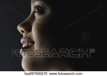 Young woman's face, profile, close-up View Large Photo Image Stock Image - Young woman's face, profile, close-up. Fotosearch